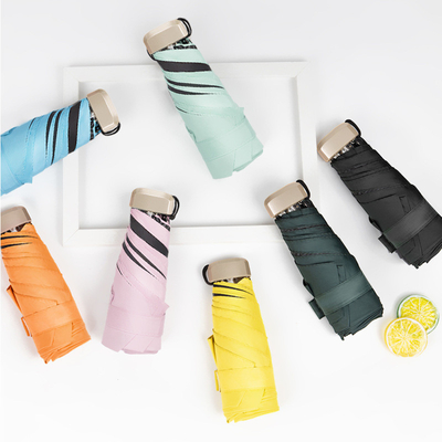 Viaggia con stile con Super Mini Pocket Anti UV Umbrella Gold Metal Fiberglass Rib