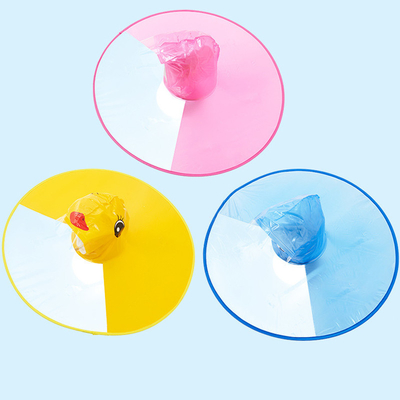 Giallo anatra impermeabile e cartone animato ombrello set per l'asilo divertimento all'aperto per bambini