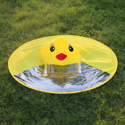 Giallo anatra impermeabile e cartone animato ombrello set per l'asilo divertimento all'aperto per bambini