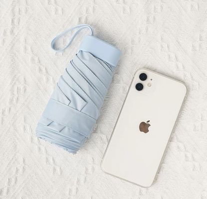 X503 Borsa da cartone Ombra Protezione UV e piccola tasca per un facile trasporto nei giorni di sole