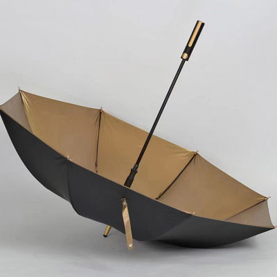 Ombrelli in tessuto rivestito d'oro con controllo semiautomatico e maniglia dorata