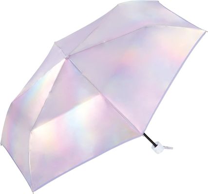 Un ombrello imperdibile per le donne urbane con protezione UV e design laser raffinato