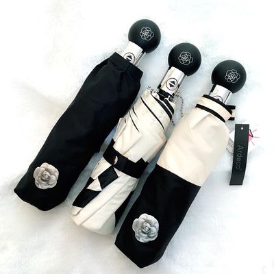 Rimanete protetti in stile Camellia protezione UV ombrello a tre pieghe per le donne coreane