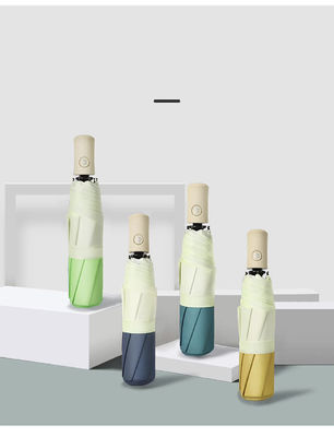 Ombrello a tre pieghe in stile coreano con albero in fibra di vetro e funzione di apertura automatica