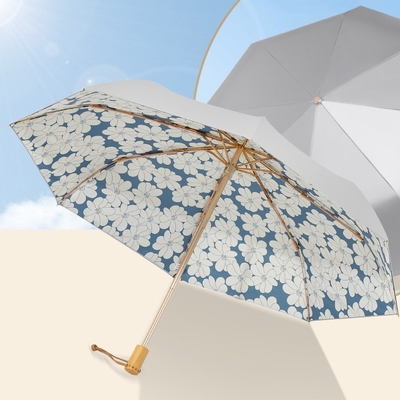 Unico ombrello di protezione contro il sole e la pioggia a tre pieghe con disegno in gomma di titanio argento