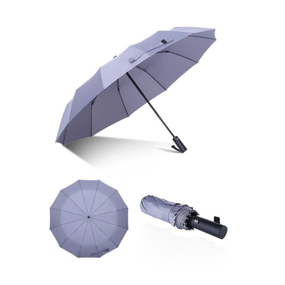 Manico rivestito di gomma 12k 23inch Windproof Triple Pliding Umbrella con logo personalizzato